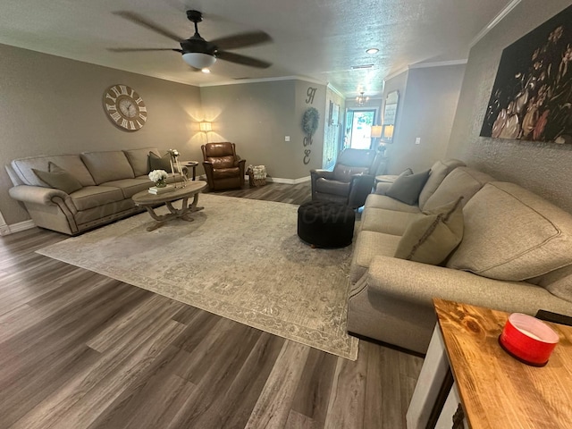 313 Mustang St, Fritch, TX 79036 - living area with ceiling fan, dark wood-type flooring, and ornamental molding