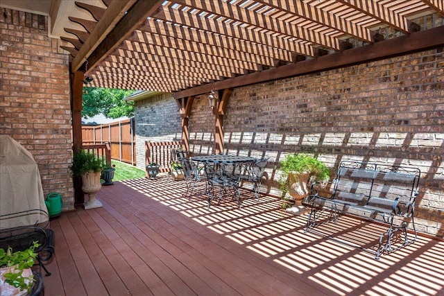 7808 Pineridge Dr, Amarillo, TX 79119 - wooden deck with a pergola and outdoor dining space
