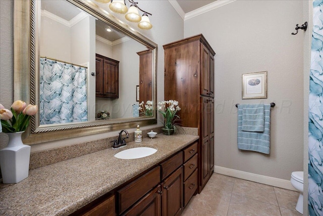 7808 Pineridge Dr, Amarillo, TX 79119 - bathroom with ornamental molding, vanity, toilet, tile patterned floors, and baseboards