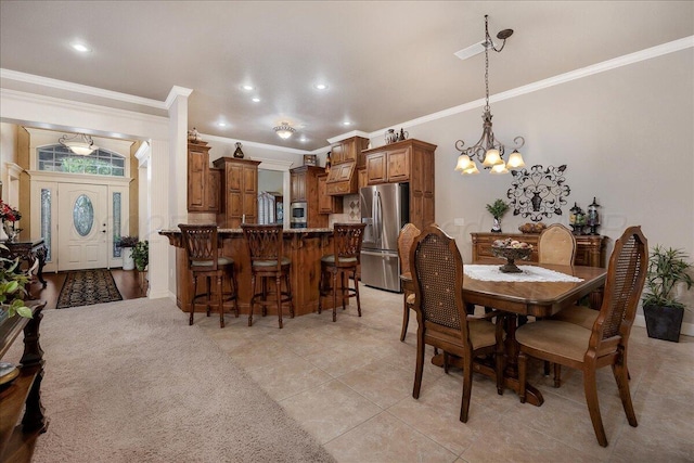 7808 Pineridge Dr, Amarillo, TX 79119 - dining room featuring a chandelier, crown molding, light tile patterned floors, and recessed lighting
