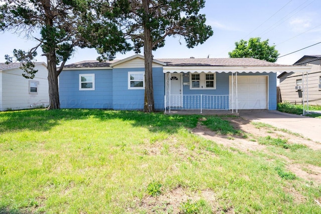 3804 NE 26th Ave, Amarillo, TX 79107 - ranch-style home with a garage, driveway, a porch, and a front lawn