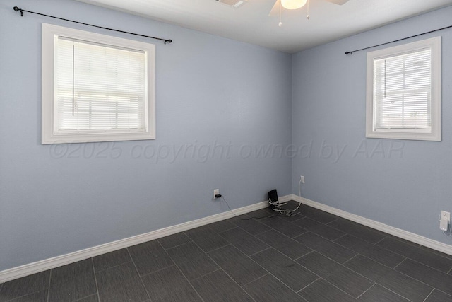 3804 NE 26th Ave, Amarillo, TX 79107 - spare room featuring ceiling fan and baseboards