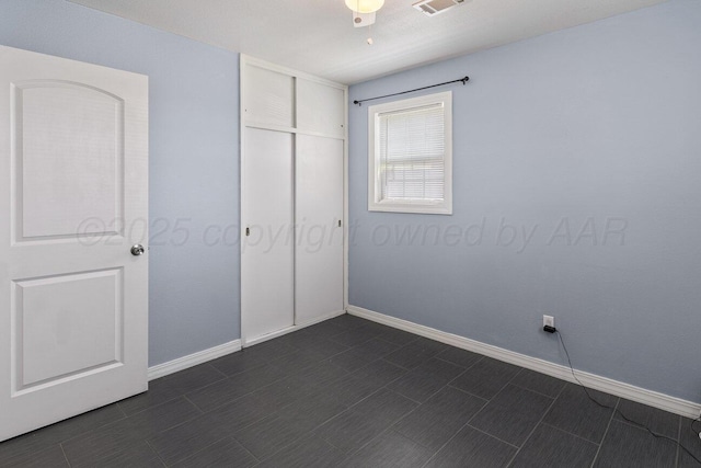 3804 NE 26th Ave, Amarillo, TX 79107 - unfurnished bedroom with baseboards and a closet