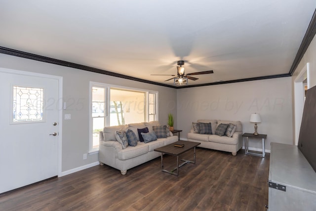 living area with ornamental molding, a ceiling fan, and dark wood-style floors