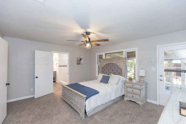 bedroom featuring baseboards, ensuite bathroom, a ceiling fan, and carpet flooring