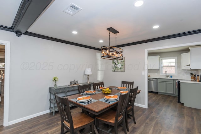 dining area with dark wood-style flooring, recessed lighting, baseboards, visible vents, and ornamental molding
