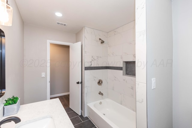 full bathroom featuring visible vents, tile patterned flooring, vanity, washtub / shower combination, and recessed lighting