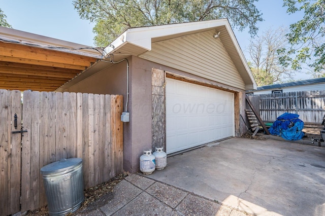 view of side of property with a garage