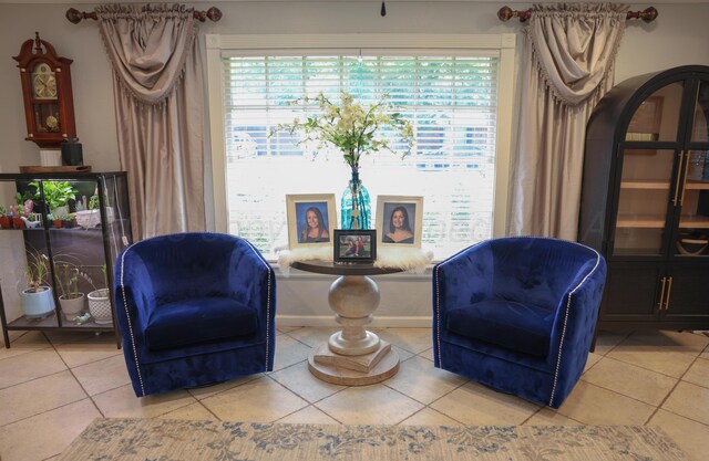 210 Ranger St, Hereford, TX 79045 - sitting room with tile patterned floors and plenty of natural light