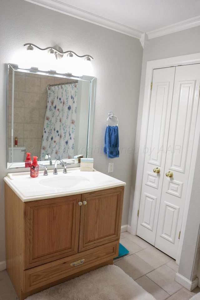 210 Ranger St, Hereford, TX 79045 - full bath with crown molding, vanity, a shower with shower curtain, and tile patterned flooring