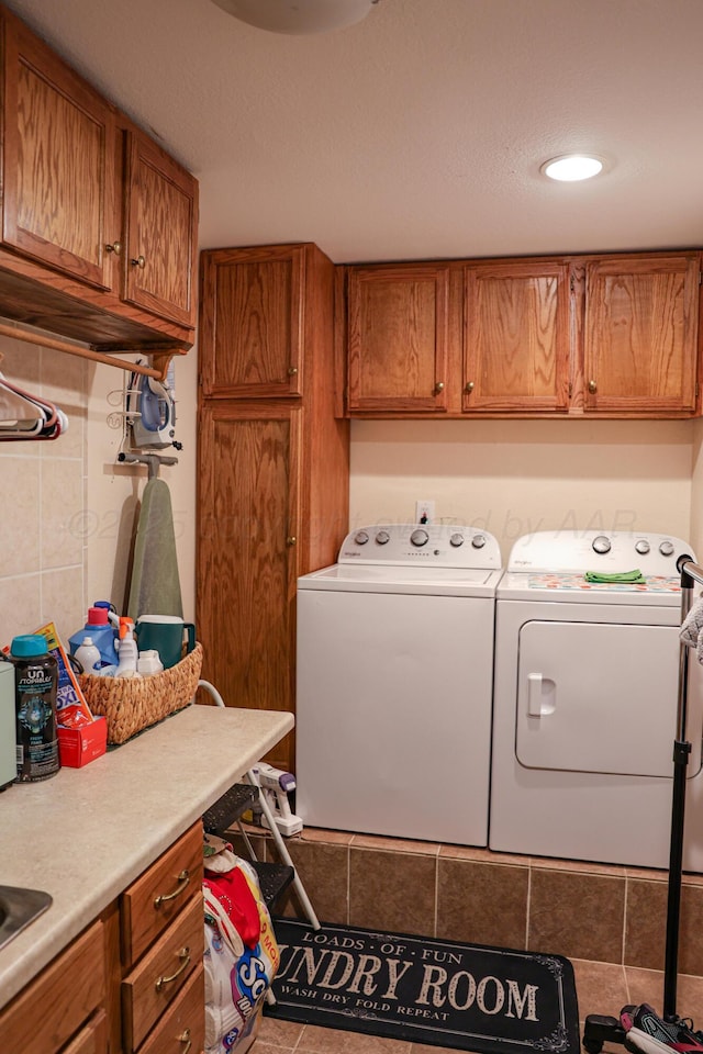 210 Ranger St, Hereford, TX 79045 - washroom featuring washer and dryer and cabinet space