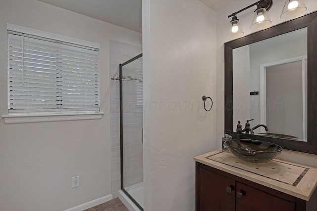 3408 Carlton Dr, Amarillo, TX 79109 - bathroom featuring a stall shower, vanity, and tile patterned floors