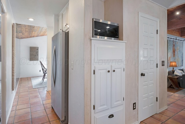 3408 Carlton Dr, Amarillo, TX 79109 - hallway featuring light tile patterned flooring and baseboards
