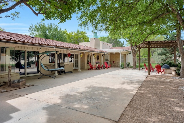3408 Carlton Dr, Amarillo, TX 79109 - back of house featuring a patio area, a pergola, and a chimney