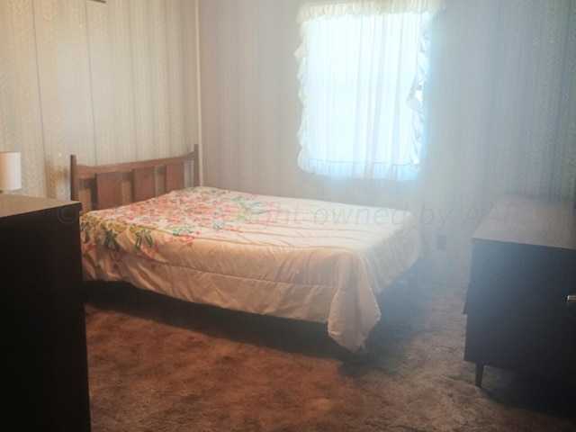 905 Harrington St, Borger, TX 79007 - bedroom featuring carpet