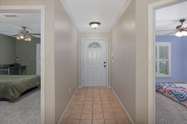 3507 Brennan Gdns, Amarillo, TX 79121 - doorway with ceiling fan, crown molding, and light colored carpet