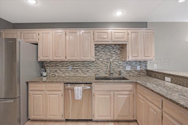 3507 Brennan Gdns, Amarillo, TX 79121 - kitchen with appliances with stainless steel finishes, backsplash, light stone counters, and recessed lighting