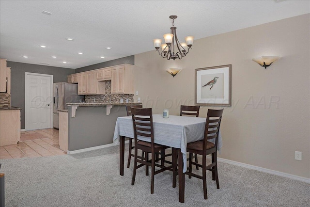 3507 Brennan Gdns, Amarillo, TX 79121 - dining area with a chandelier, light carpet, and recessed lighting
