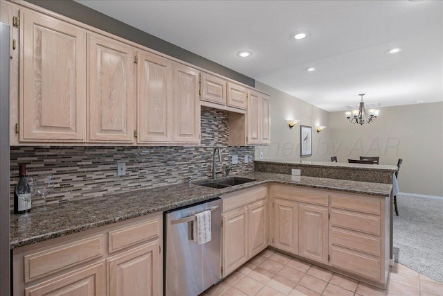 3507 Brennan Gdns, Amarillo, TX 79121 - kitchen with stainless steel dishwasher, light brown cabinetry, and recessed lighting