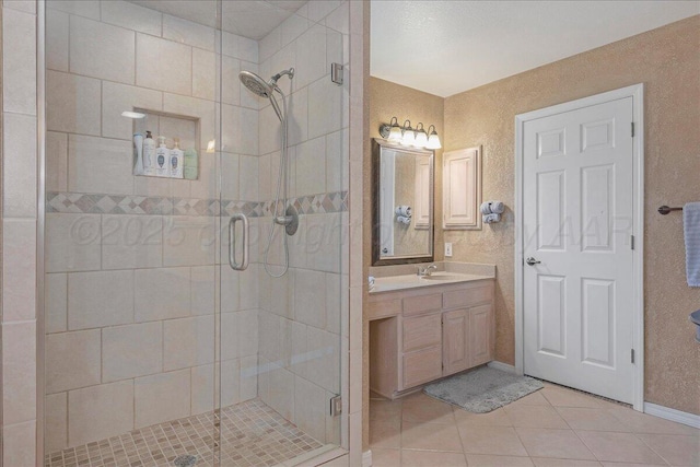 3507 Brennan Gdns, Amarillo, TX 79121 - full bath with tile patterned floors, vanity, and a stall shower