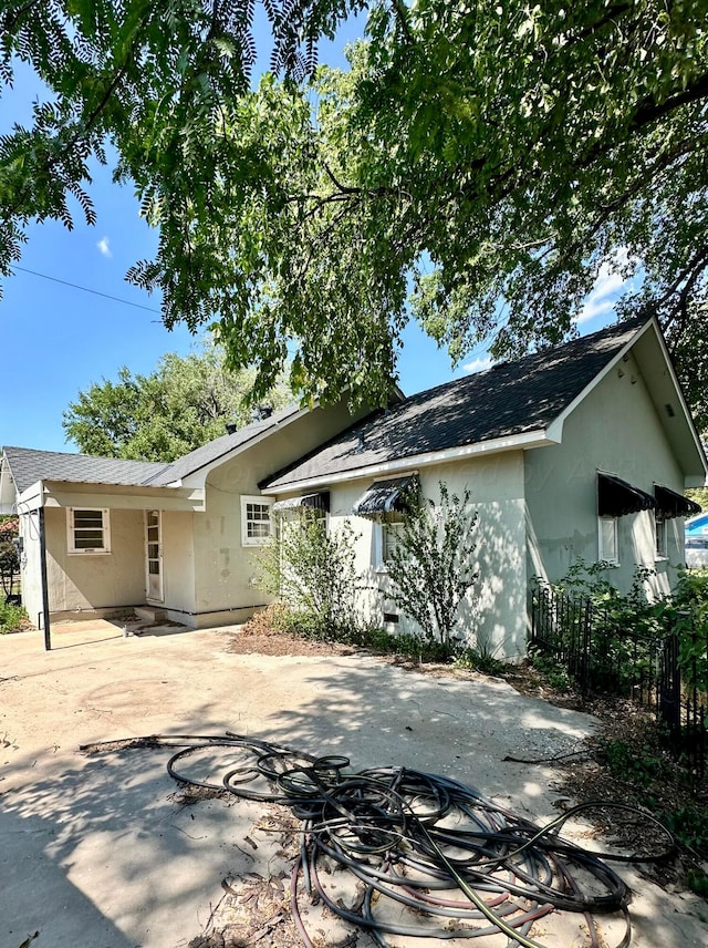 back of house featuring a patio