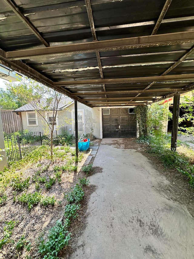 view of parking / parking lot with a garage