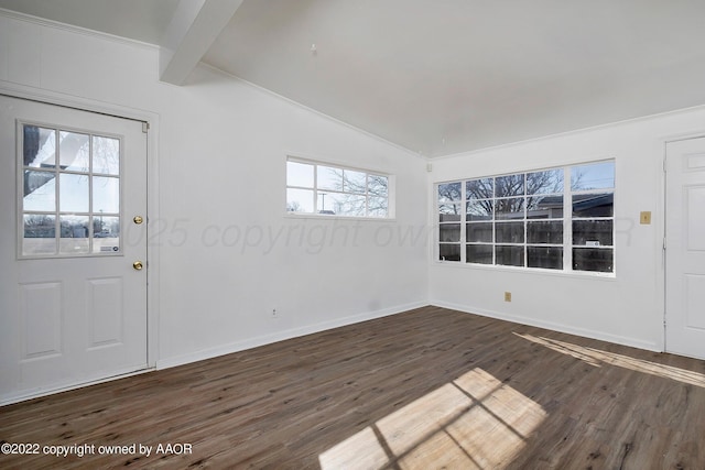 entryway featuring plenty of natural light, lofted ceiling with beams, baseboards, and dark wood-style floors