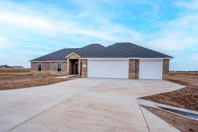 single story home with a garage