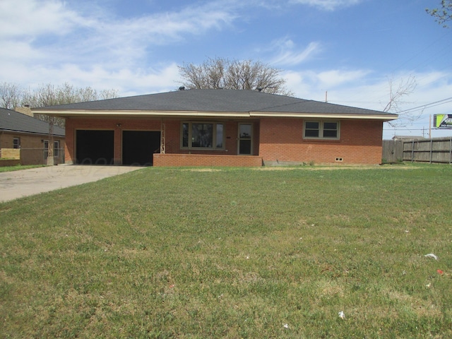 ranch-style home with an attached garage, brick siding, and concrete driveway