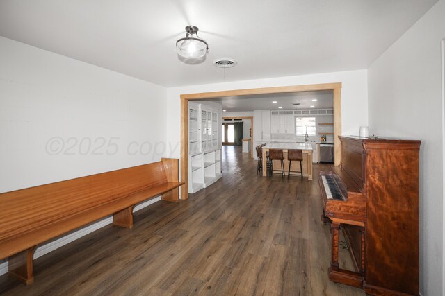 dining space featuring dark hardwood / wood-style flooring