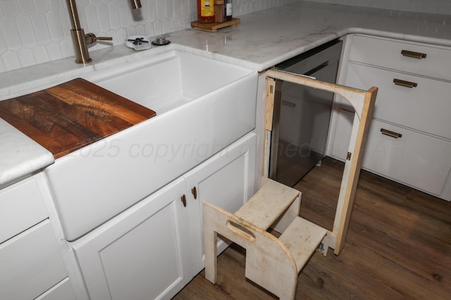 stairway featuring hardwood / wood-style flooring