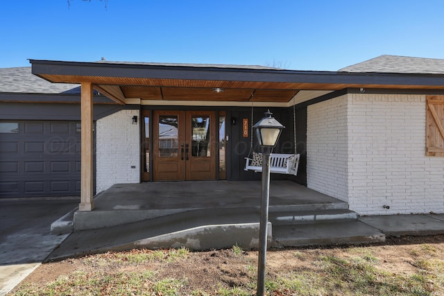 doorway to property with french doors