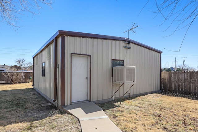 view of outdoor structure with a yard