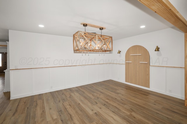 empty room with wood-type flooring