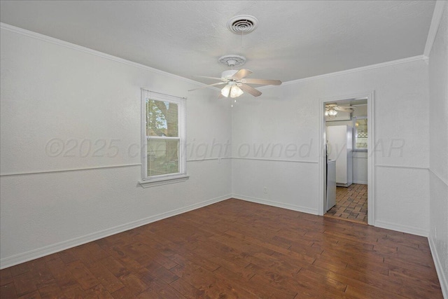 empty room featuring crown molding, ceiling fan, and plenty of natural light