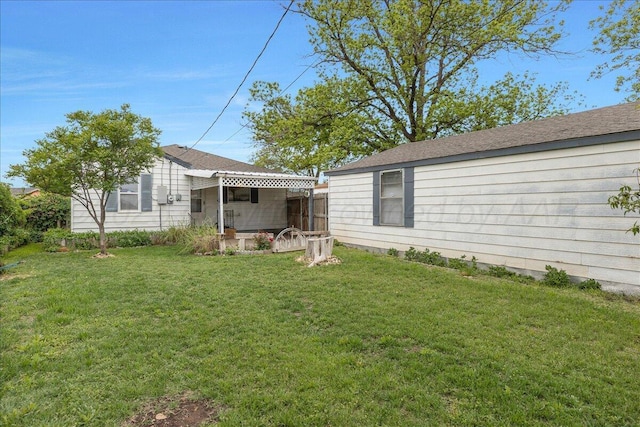 exterior space featuring a yard and a patio area