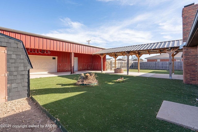 8403 Whittier Dr, Amarillo, TX 79110 - view of yard featuring an outbuilding and a garage