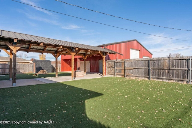 8403 Whittier Dr, Amarillo, TX 79110 - view of yard featuring an outbuilding and a garage