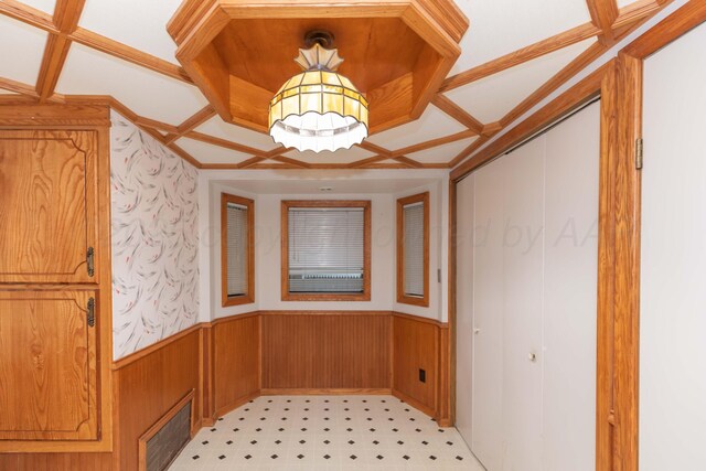 507 Aaron Rd, Fritch, TX 79036 - interior space with light floors, visible vents, and wainscoting