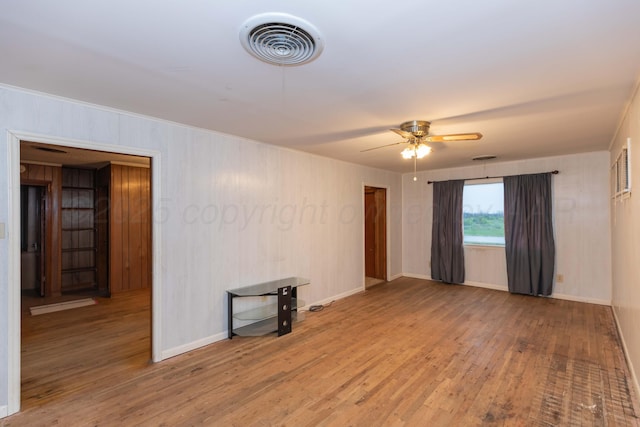 507 Aaron Rd, Fritch, TX 79036 - empty room featuring baseboards, a ceiling fan, visible vents, and wood finished floors