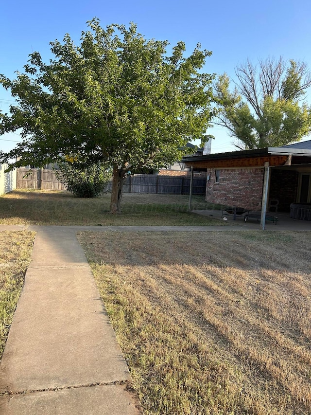 view of yard featuring fence