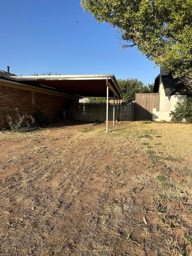 view of yard with fence