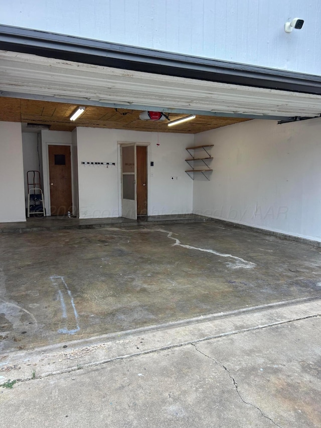 2914 Detroit St, Amarillo, TX 79103 - garage featuring a garage door opener