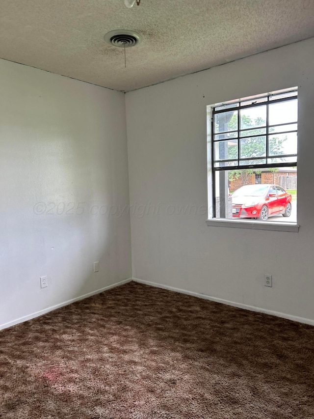 2914 Detroit St, Amarillo, TX 79103 - empty room with a textured ceiling and carpet floors