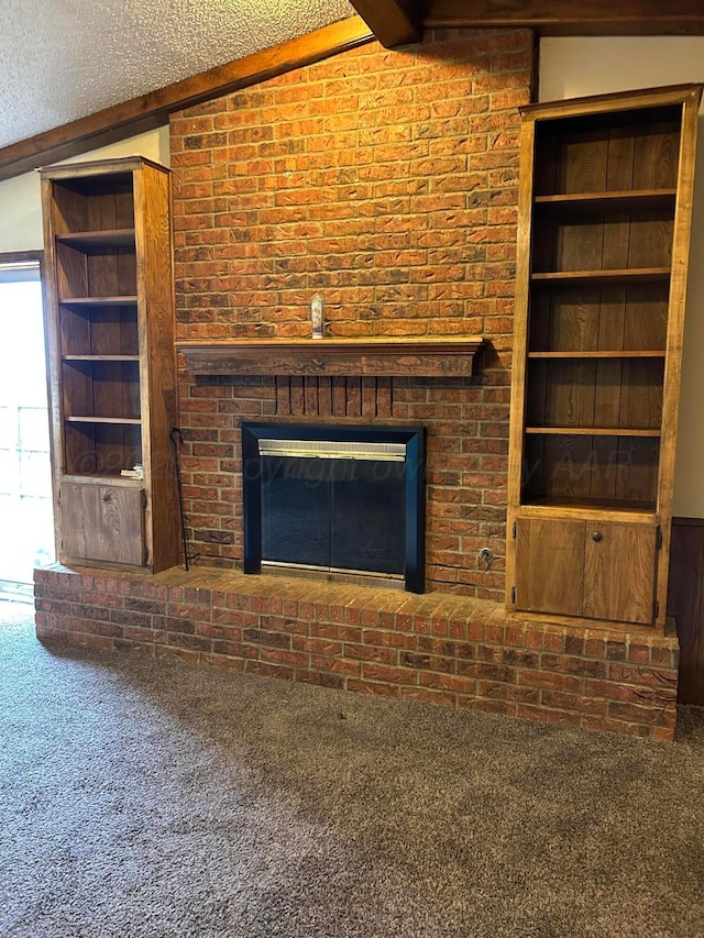2914 Detroit St, Amarillo, TX 79103 - unfurnished living room featuring carpet, a brick fireplace, and built in shelves