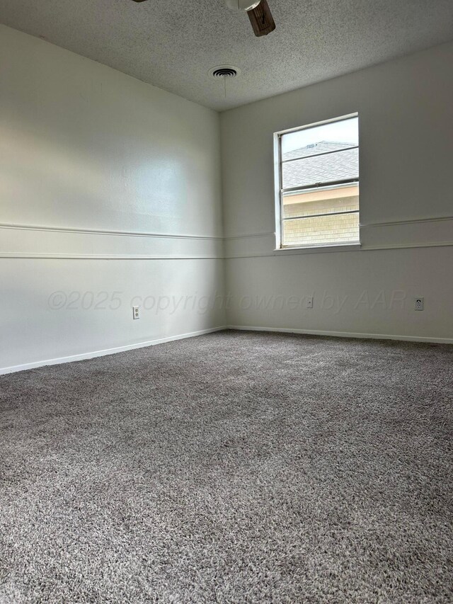 2914 Detroit St, Amarillo, TX 79103 - empty room featuring a textured ceiling and baseboards