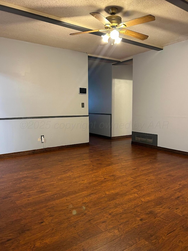 2914 Detroit St, Amarillo, TX 79103 - spare room with a ceiling fan, dark wood finished floors, and a textured ceiling