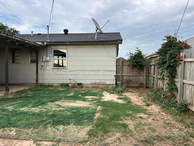 2914 Detroit St, Amarillo, TX 79103 - back of house featuring roof with shingles