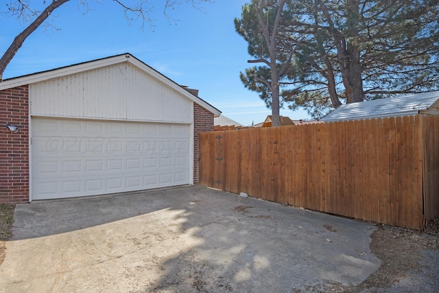 detached garage with fence