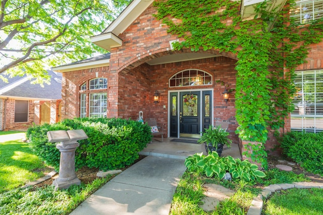 7821 Covington Pkwy, Amarillo, TX 79121 - property entrance with brick siding and a porch